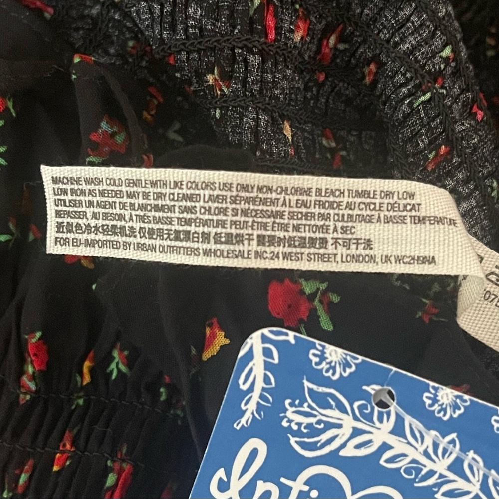 Free People Bella Black Floral Print Smocked Tie-Strap Bodycon Mini Dress NWT - Picture 7 of 9